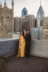 Photograph by Kayla Neveil Photograph, a Philadelphia wedding photographer, Philadelphia engagement photographer. A blog post about amazing spots for engagement photos in Philadelphia. An engagement photo taken atop the Center City parking garage. 