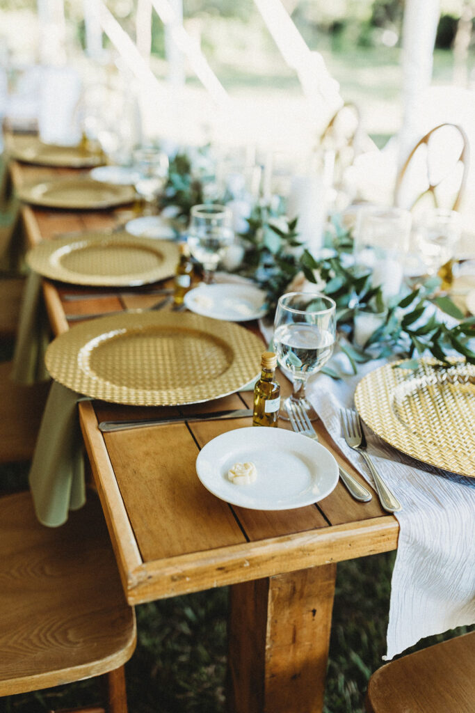 Festive backyard wedding reception table set up in Pennsylvania, with vibrant decor