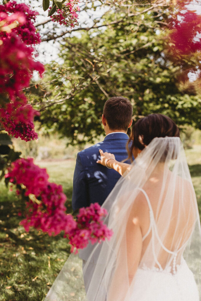 Touching first look between Christine and Michael, set against the backdrop of their intimate backyard wedding in Pennsylvania