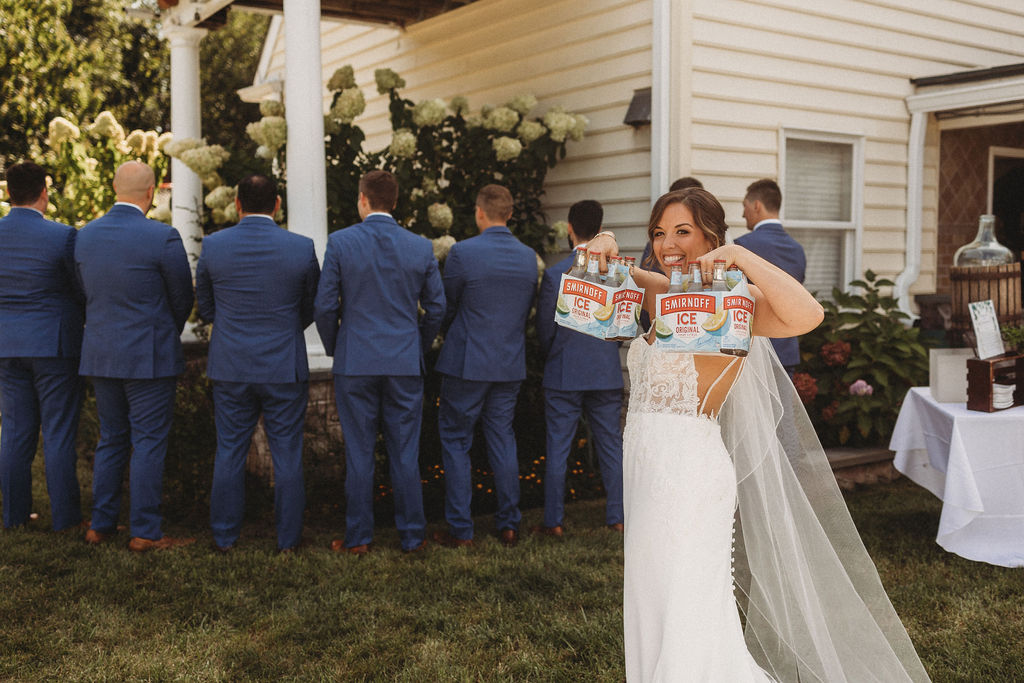 Wedding party's excited reactions as they see the bride for the first time on the wedding day