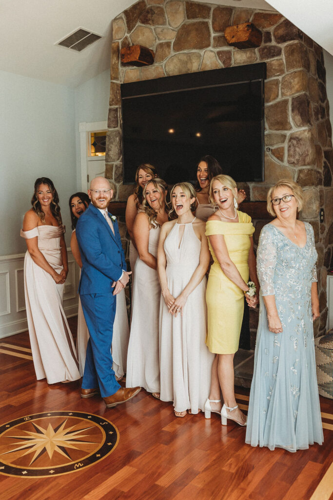 Wedding party's excited reactions as they see the bride for the first time on the wedding day