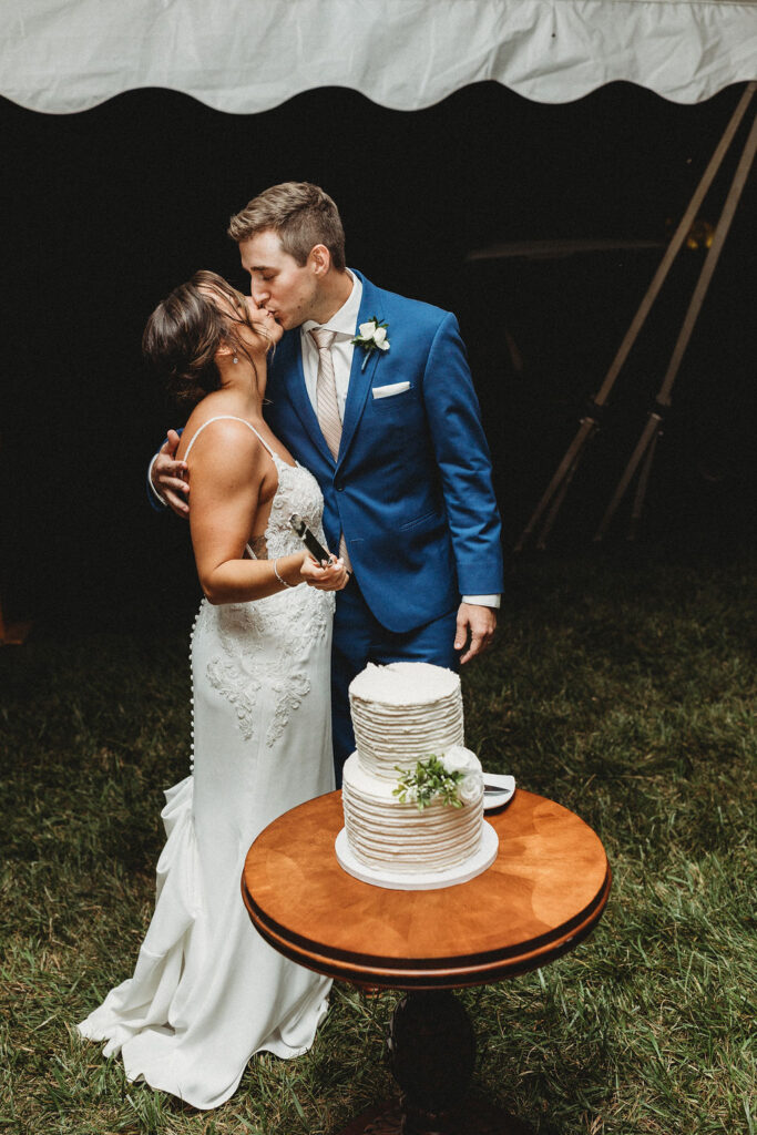 Bride and groom cutting cake