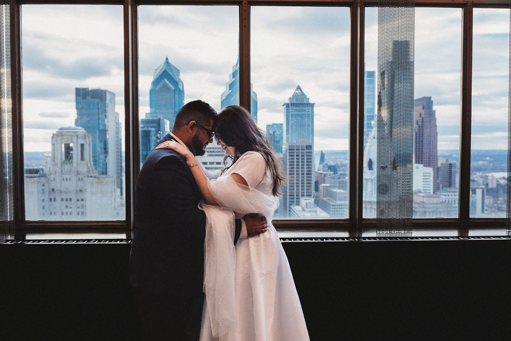 bride and groom hugging in a hotel wedding venue in philadelphia