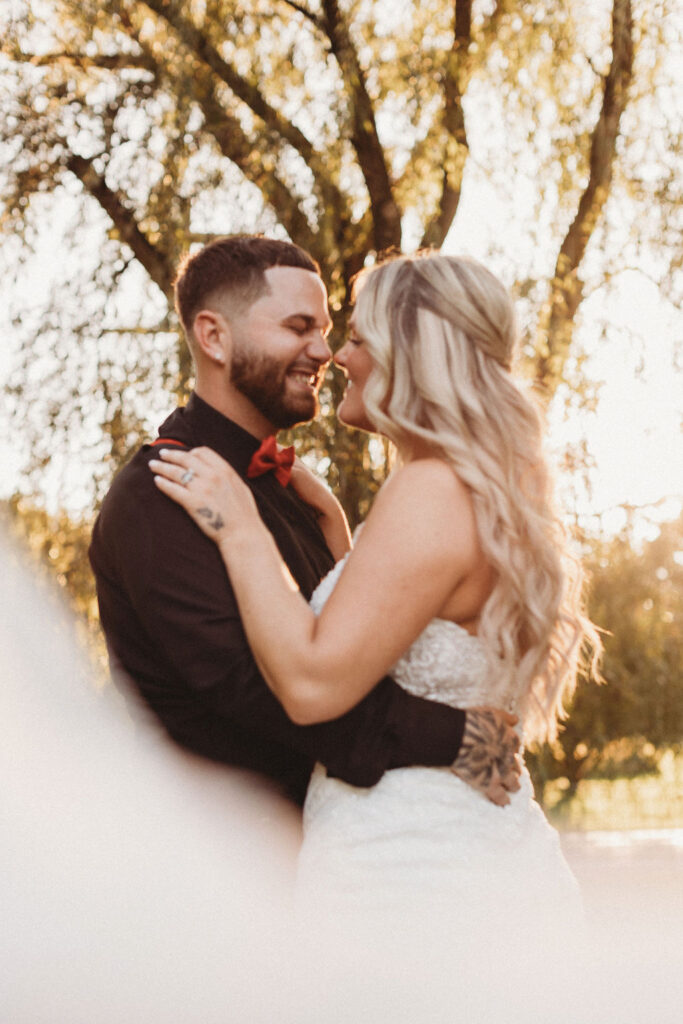 romantic golden hour bride and groom wedding photo
