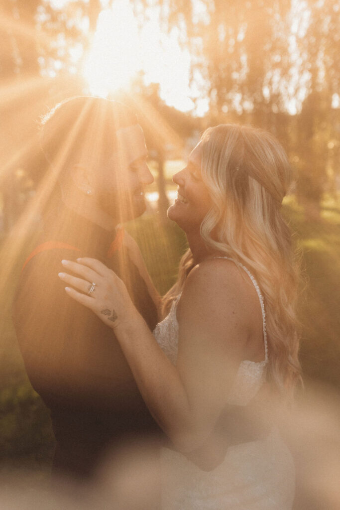 romantic golden hour bride and groom wedding photo
