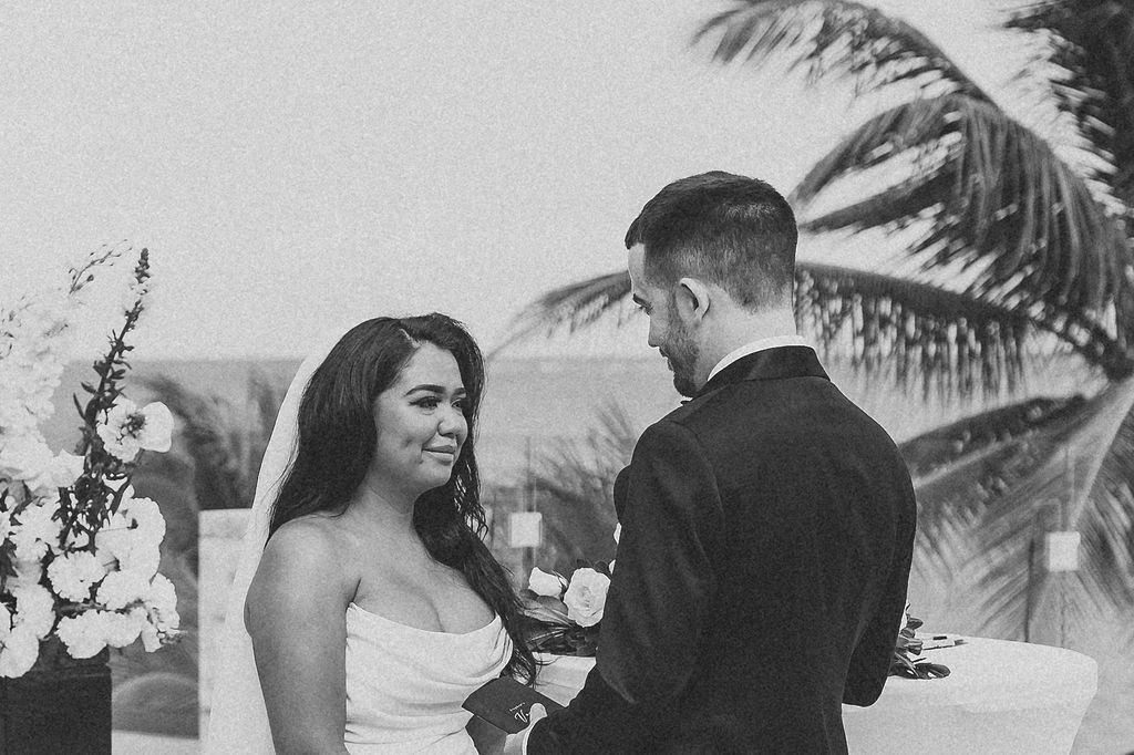 emotional bride and groom photo as they exchange their vows during their destination wedding in hawaii