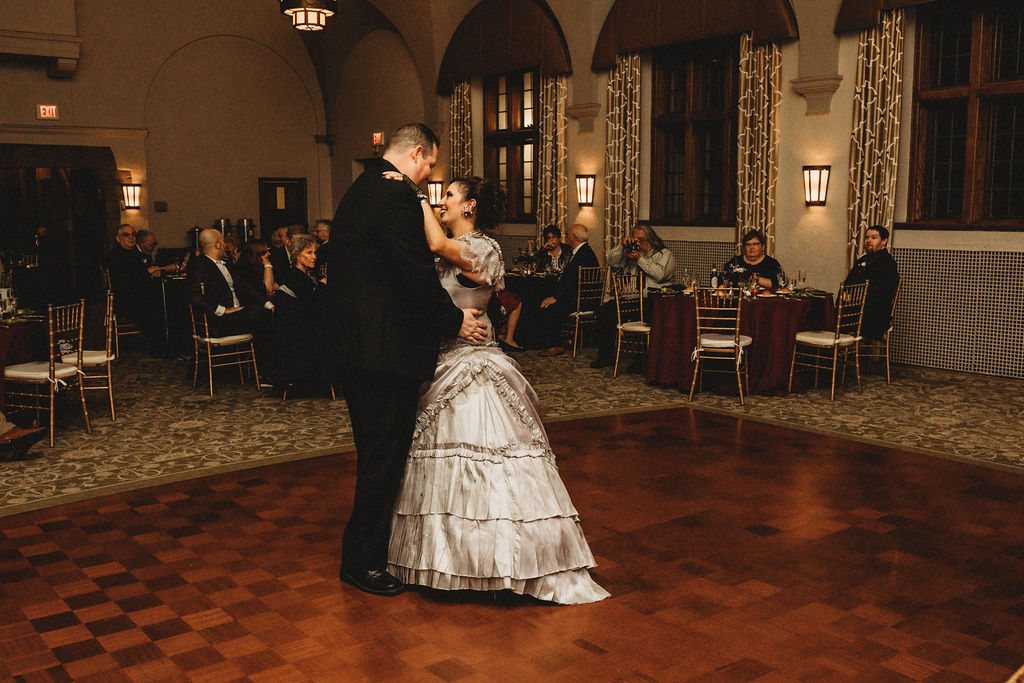 dark and moody wedding reception in Merion Tribute house