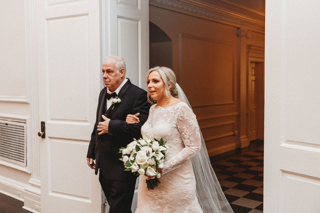 dad walking bride down the aisle during a downtown club philadelphia wedding ceremony