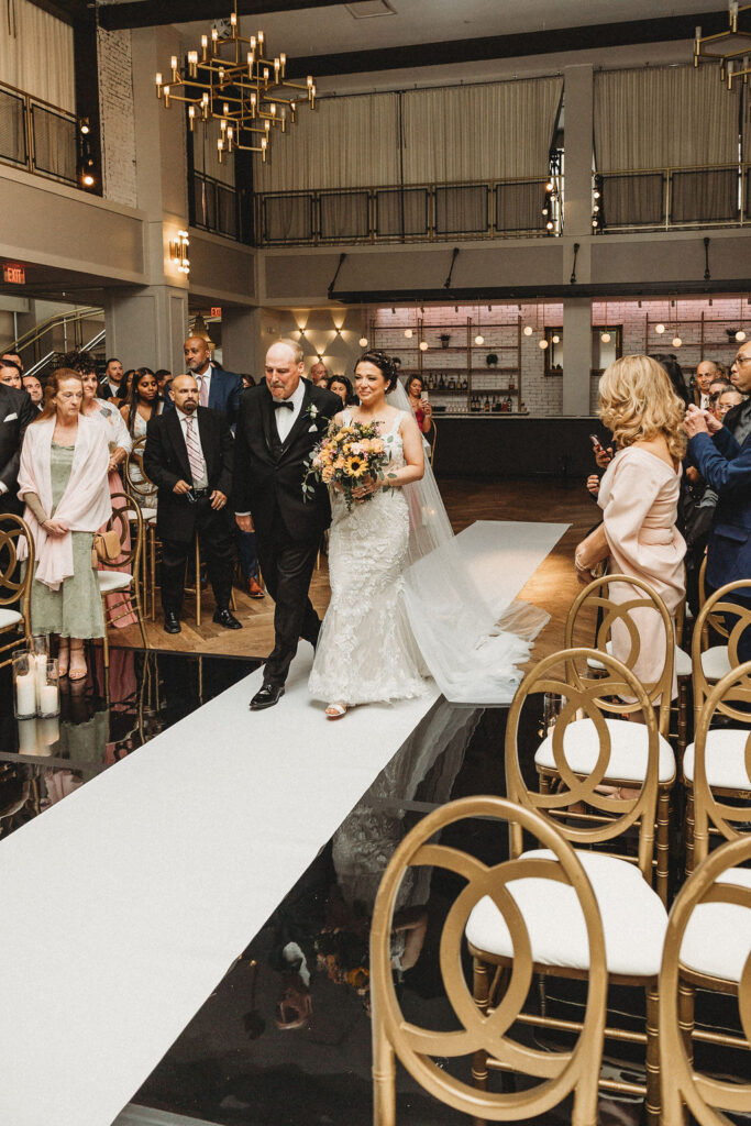 dad leading bride down the aisle 