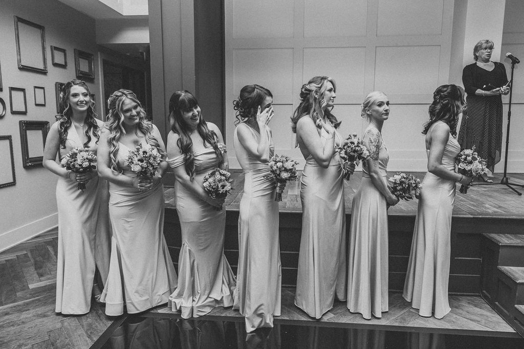 emotional bridesmaids waiting at the altar