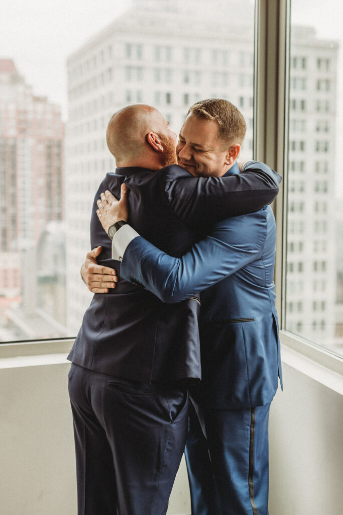 groom getting ready in a hotel room